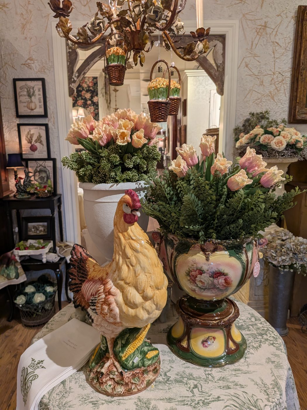 French country vignette with a majolica rooster and toile at Home Sweet Home Plymouth