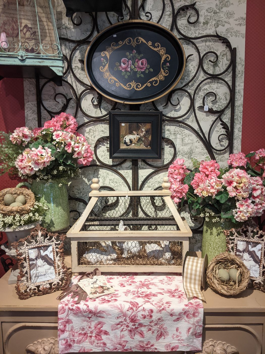 Wrought-iron gate panel and garden treasures at Home Sweet Home in the Metro Detroit area