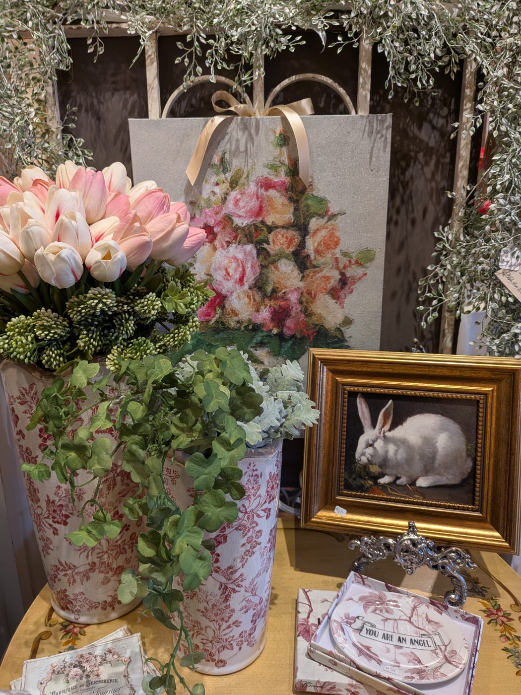 Gifts and home décor styled in a seasonal vignette