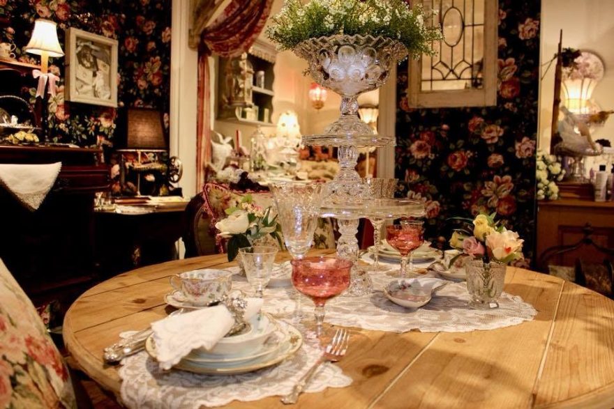 Period crystal stemware and cut-glass on a lace-set table