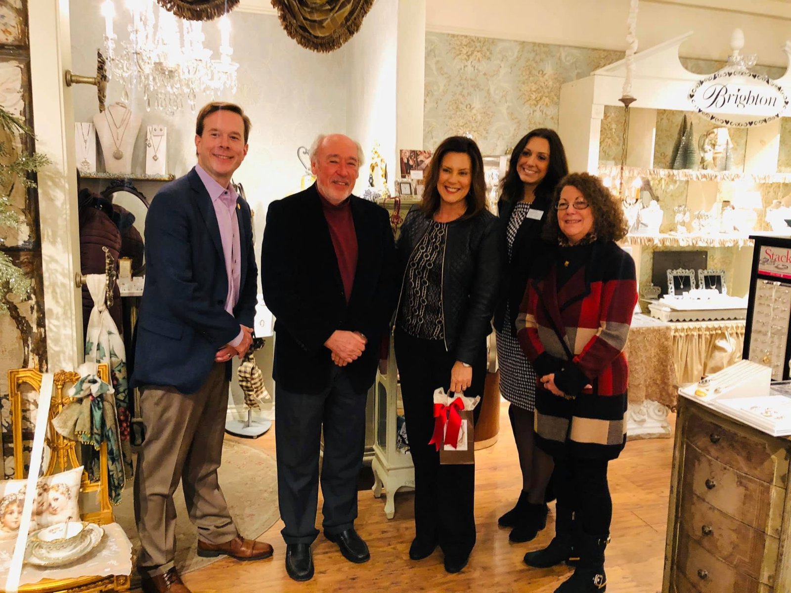 Governor Gretchen Whitmer with Carol and Robert May inside Home Sweet Home during her December 2019 visit to the shop in downtown Plymouth